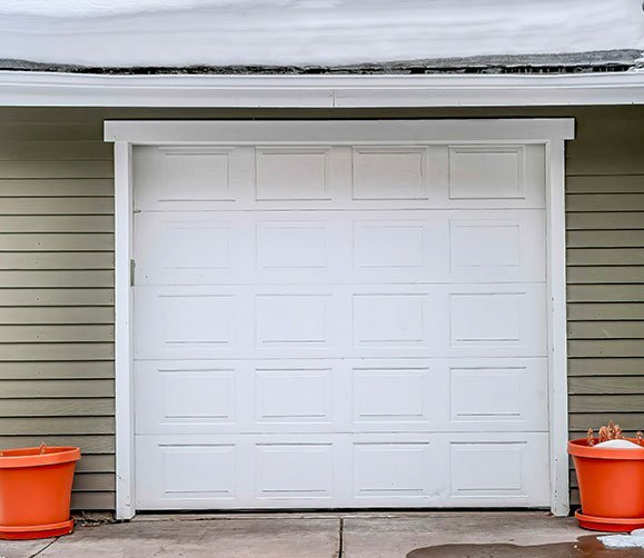 Should You Consider Extension Or Torsion Spring For Broken Garage Door?